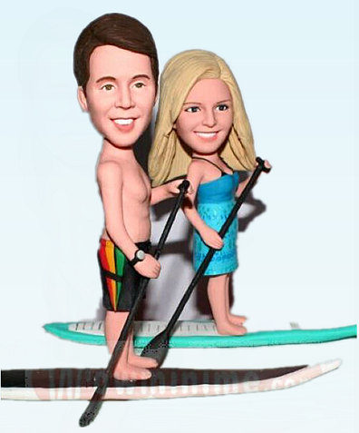 Custom cake topper couple on paddleboards