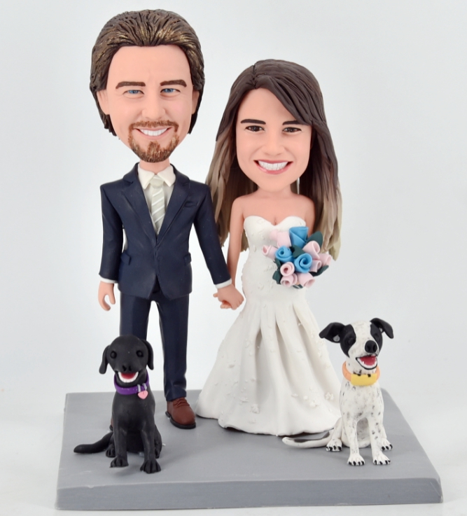 Custom cake topper wedding ceremony with two dog sitting aside