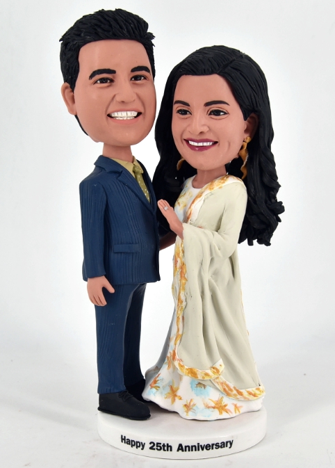Custom cake toppers wearing my own suit and wedding dress