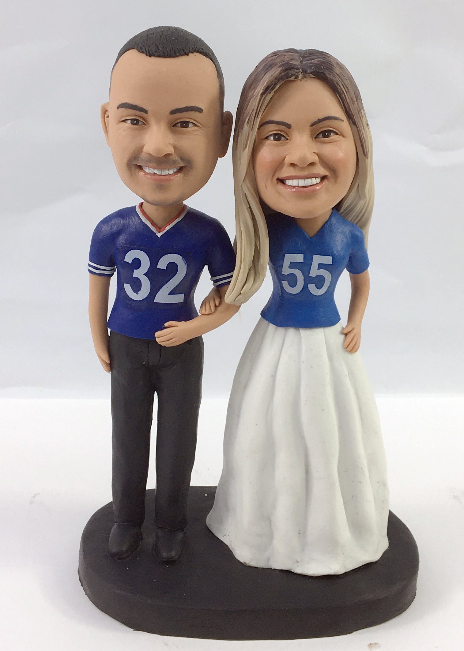 Custom cake toppers wearing our favorite team jerseys(any team)