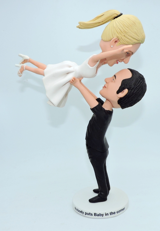 Custom cake toppers groom lift bride in the air