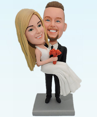 Custom cake toppers Groom holding bride