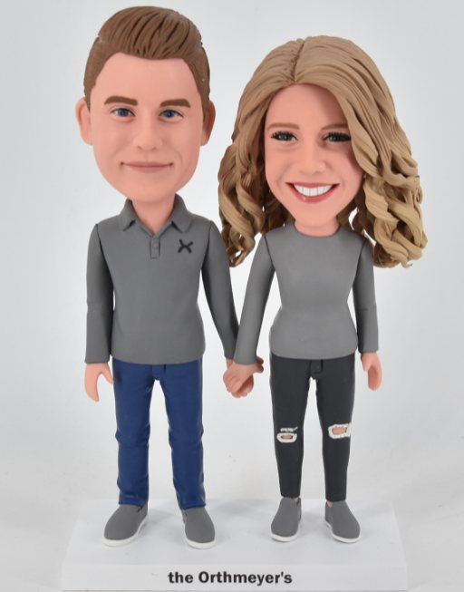Custom cake toppers in couple cloths