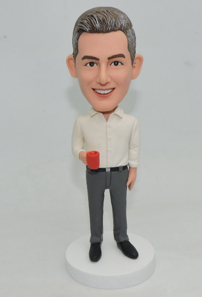 Custom Bobbleheads Figurines Manager holding a cup of coffee