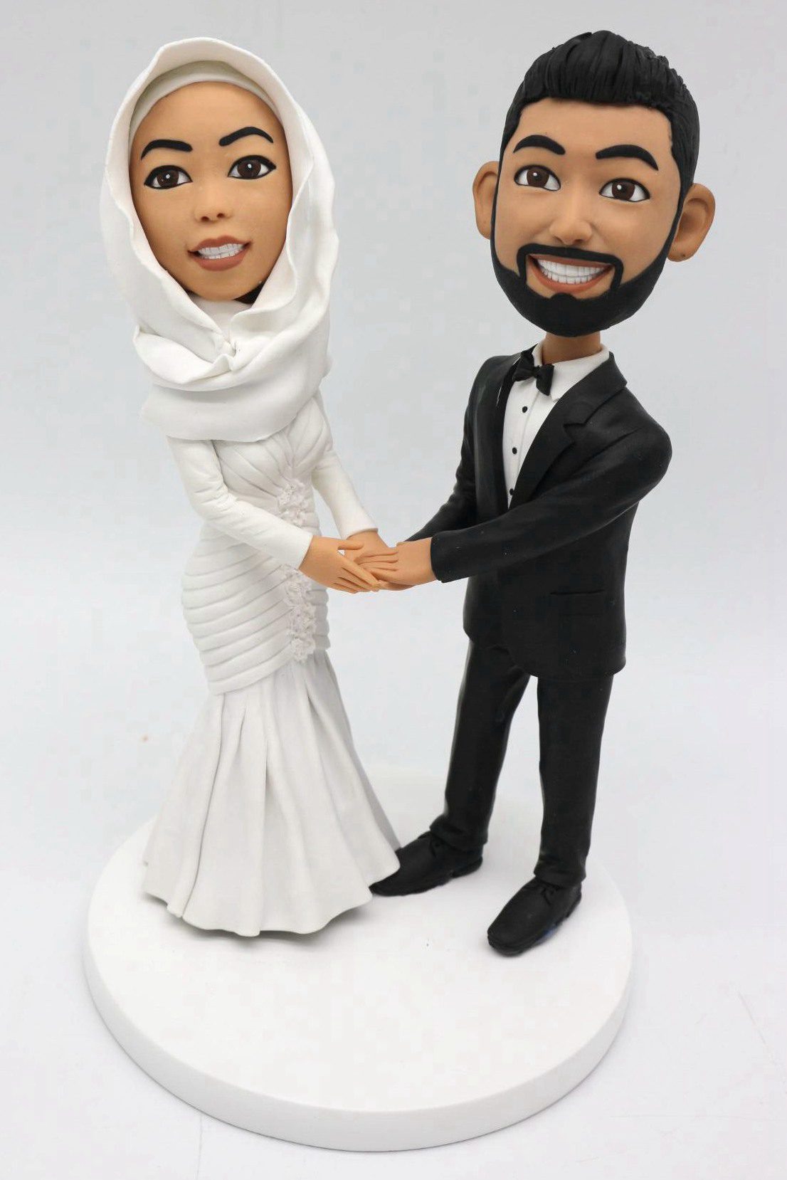 Custom cake toppers Groom and bride hand in hand dancing